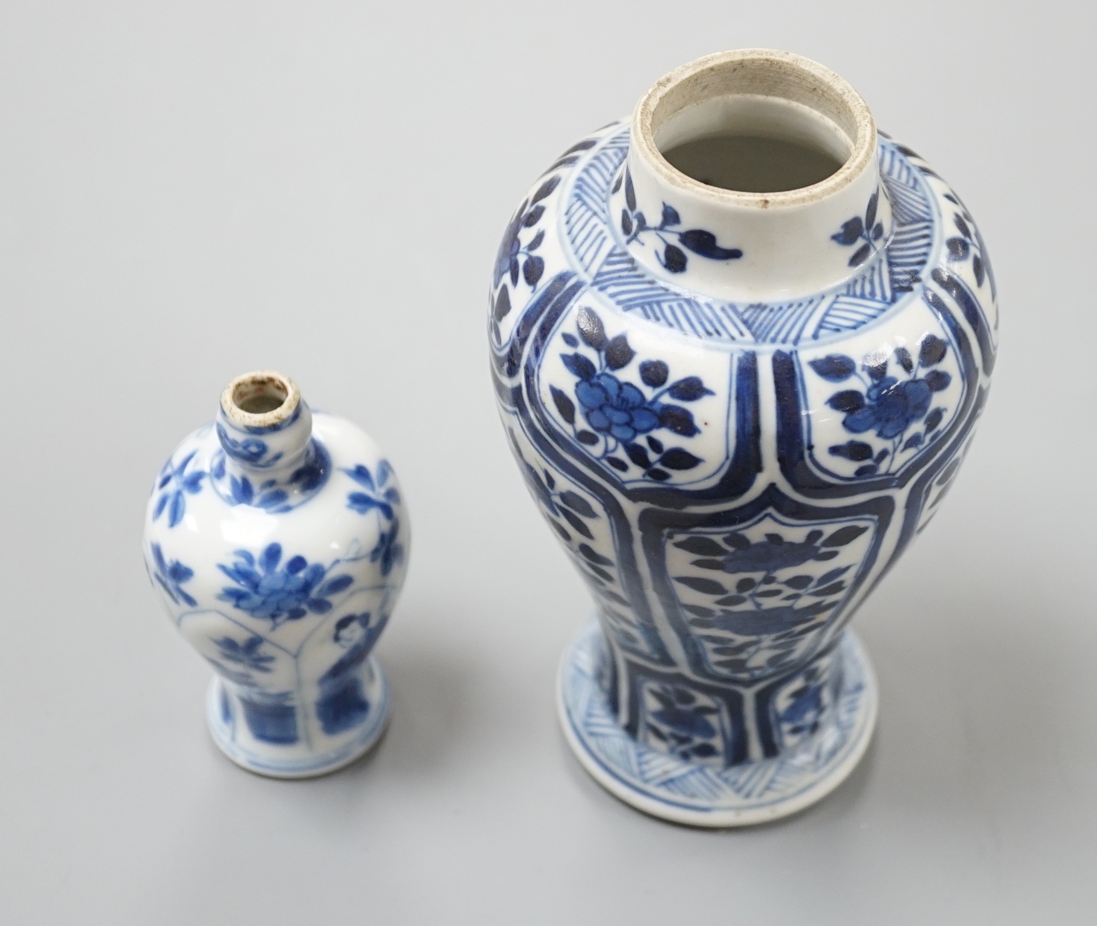 Two Chinese Kangxi blue and white vases, the smallest marked ‘yu’ (jade), tallest 15 cms high.
